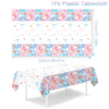Pink and blue patterned plastic tablecloth used as a gender reveal party table covering