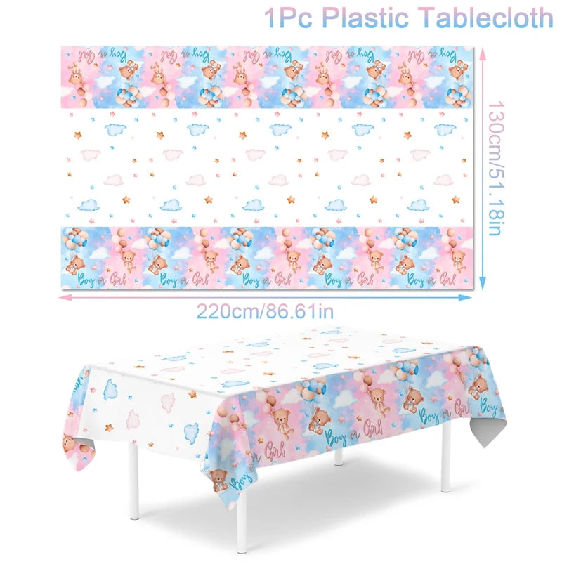 Pink and blue patterned plastic tablecloth used as a gender reveal party table covering