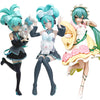 Three Gothic Lolita Miku action fairy dolls in various poses and outfits