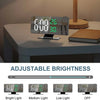 An LED digital projection alarm clock displaying the time and temperature, with options for adjustable brightness.