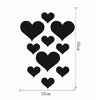 A set of black heart-shaped 3D acrylic mirror wall stickers arranged in a cluster.