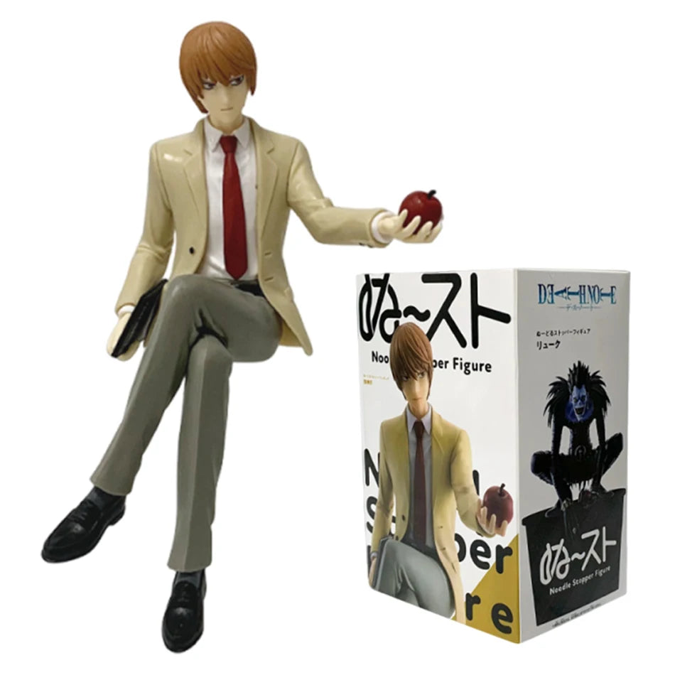 PVC figure of Death Note characters Light, L, and Ryuk standing together.