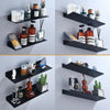 Black floating metal wall shelves displaying various glass and pump bottles for bathroom and kitchen storage