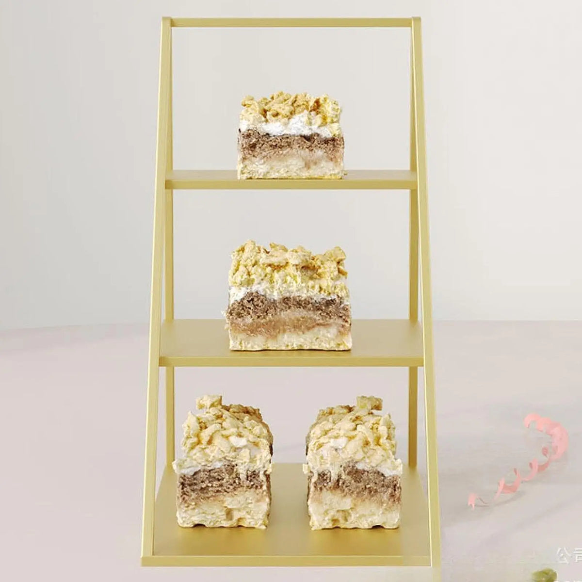 A three-tier gold display rack holding various cosmetic and jewelry products.