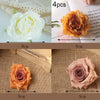 A set of four golden palm leaf cake toppers featuring detailed flower decorations in various shades of orange and pink.