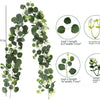Artificial eucalyptus garland featuring leaves and decorative flowers shown in various sizes