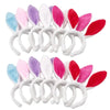 A set of colorful bunny ear headbands featuring pink, purple, and white faux fur ears.