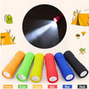 A set of nine colored LED pocket flashlights in orange, green, yellow, red, blue, and black are displayed with a demonstratio