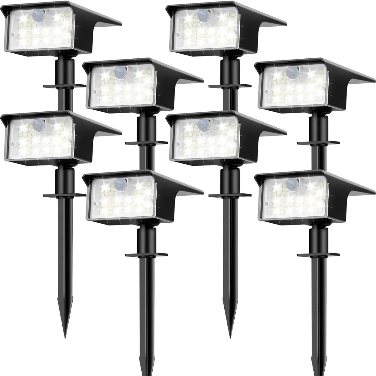 Two black solar powered motion sensor spot lights mounted on poles.