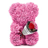 Rosa künstlicher Rosen-Teddybär aus dicht gepackten Rosen für romantische Dekoration.