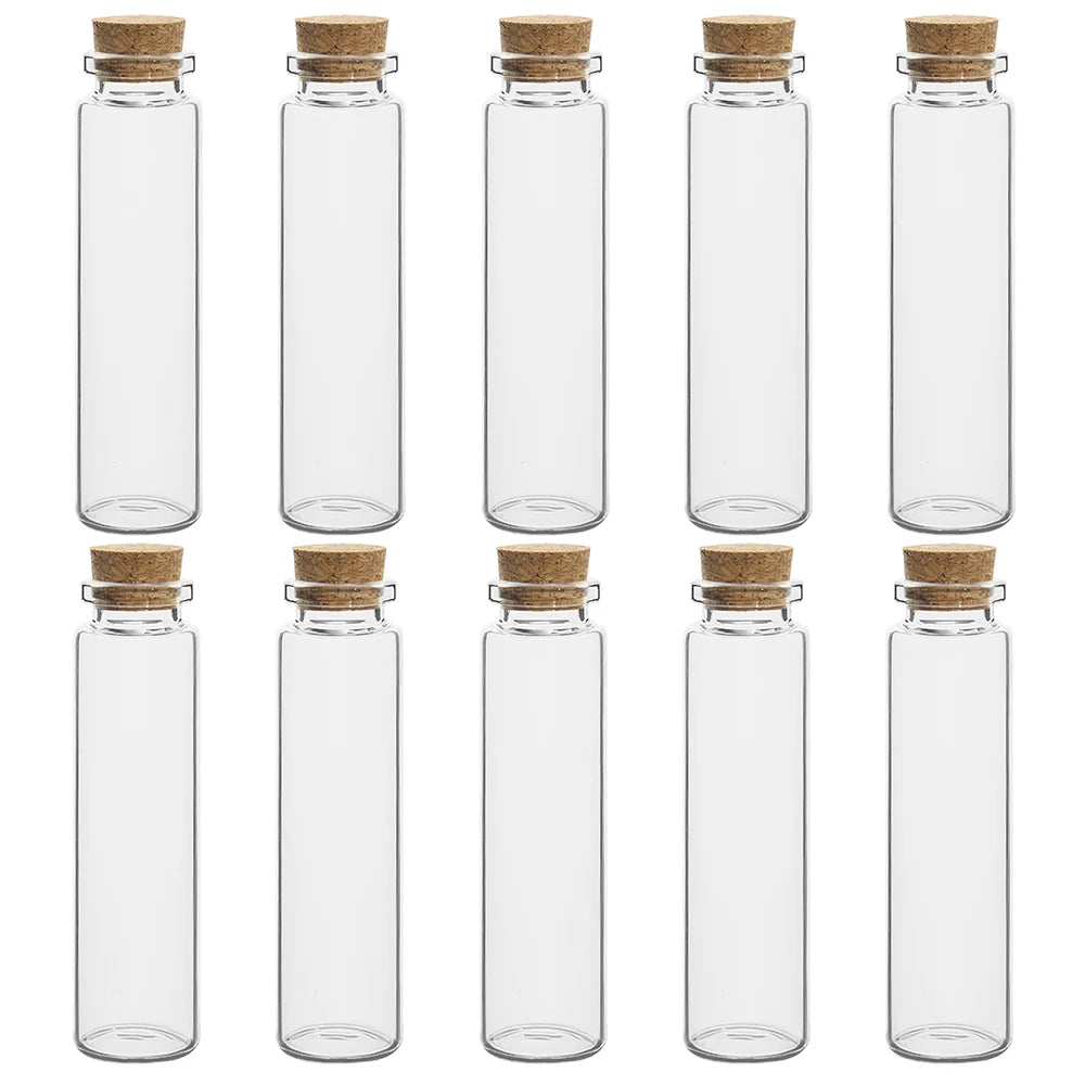 A row of decorative glass vials with cork stoppers, showing various clear glass bottles.