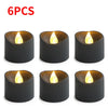 Six pieces of black flameless LED candles with a warm white glow