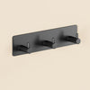 A dark gray extra thick self-adhesive wall hook designed for hanging keys and jewelry.