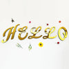 Gold 3D acrylic letter wall stickers spelling HELLO decorated with small floral elements