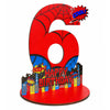 A red wooden sign shaped like the number 6 with a spiderweb design and 'GOOO!' text, used for a birthday party.