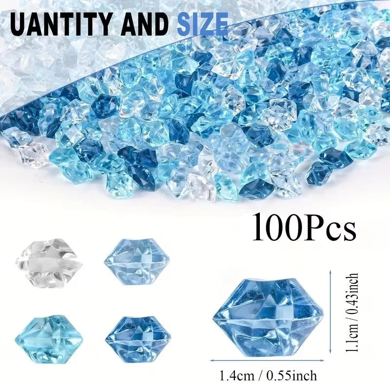 A collection of clear and blue acrylic ice rocks, including faceted gems and rough pieces.