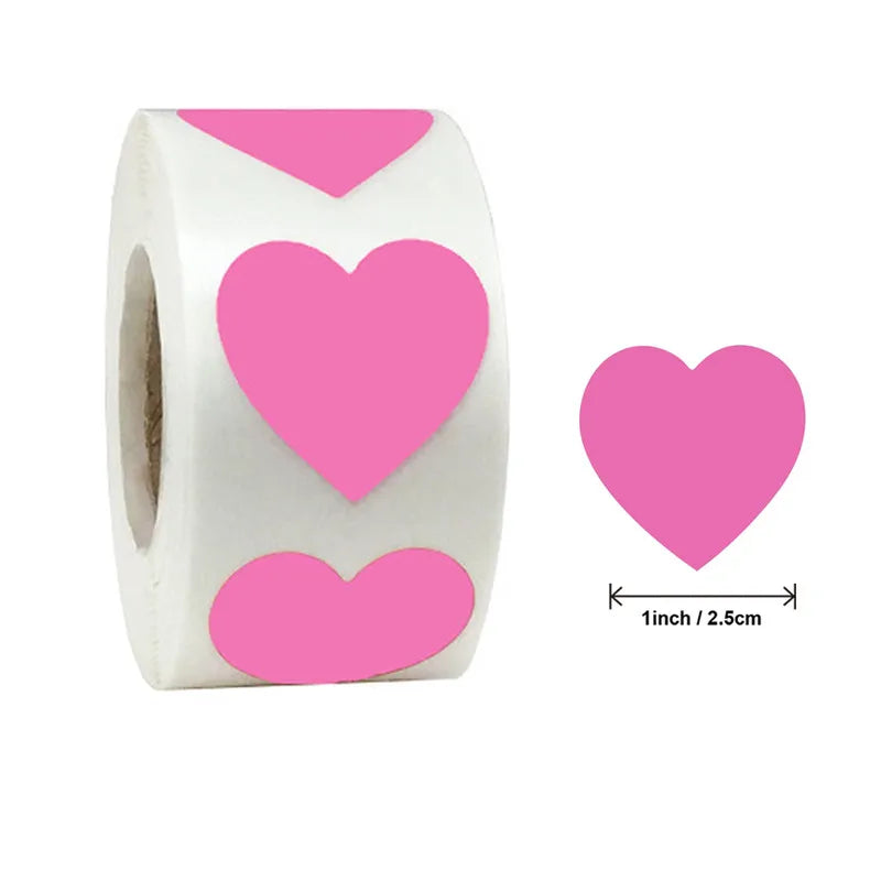 Roll of pink heart-shaped seal stickers for crafting and packaging