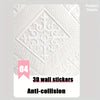 A close-up view of white 3D wall stickers featuring an ornate diamond pattern for anti-collision use.