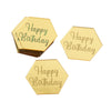 A set of ten gold hexagonal acrylic birthday toppers with the text Happy Birthday