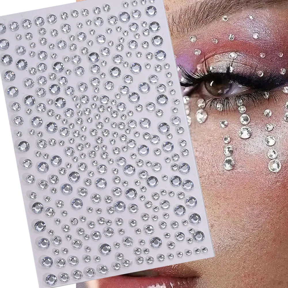 A sheet of glitter gems used for stick-on facial tattoos applied to an eye area.