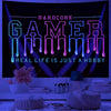 A dark banner featuring the text HARDCORE GAMER and a purple glow, set against a blue background.