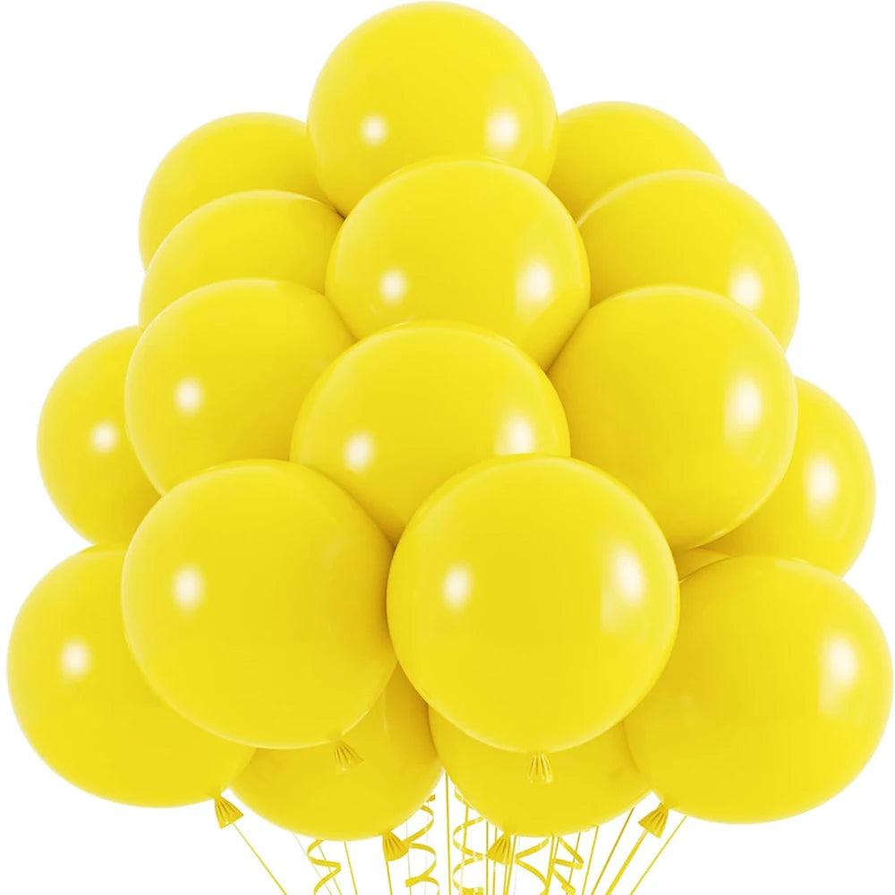 A bunch of bright yellow latex balloons tied together for a party or celebration