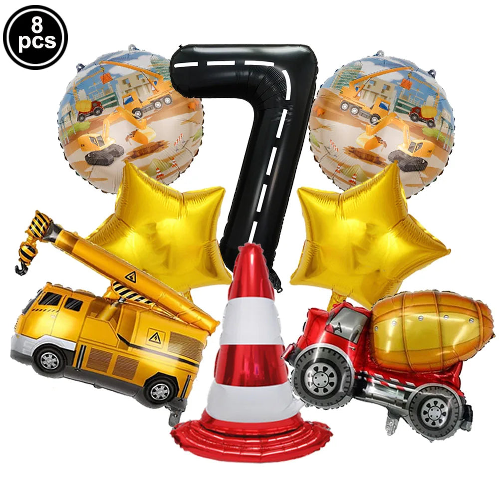 Eight construction truck foil balloons and a red and white traffic cone for birthday party decor