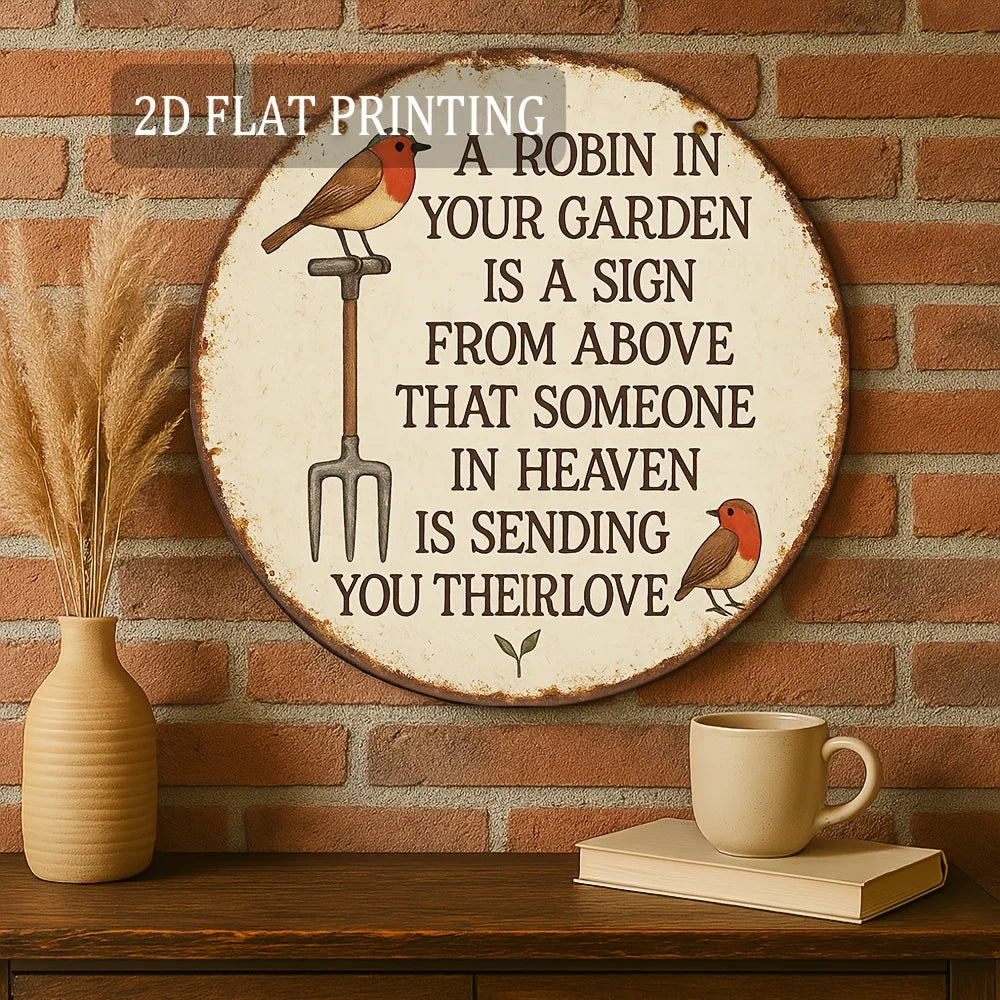 Diseño de impresión plana 2D con un petirrojo sentado en un tenedor de jardín y texto sobre el cielo enviando su amor.