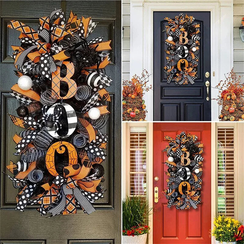 A black and orange Halloween BOO wreath with a pumpkin garland door hanging