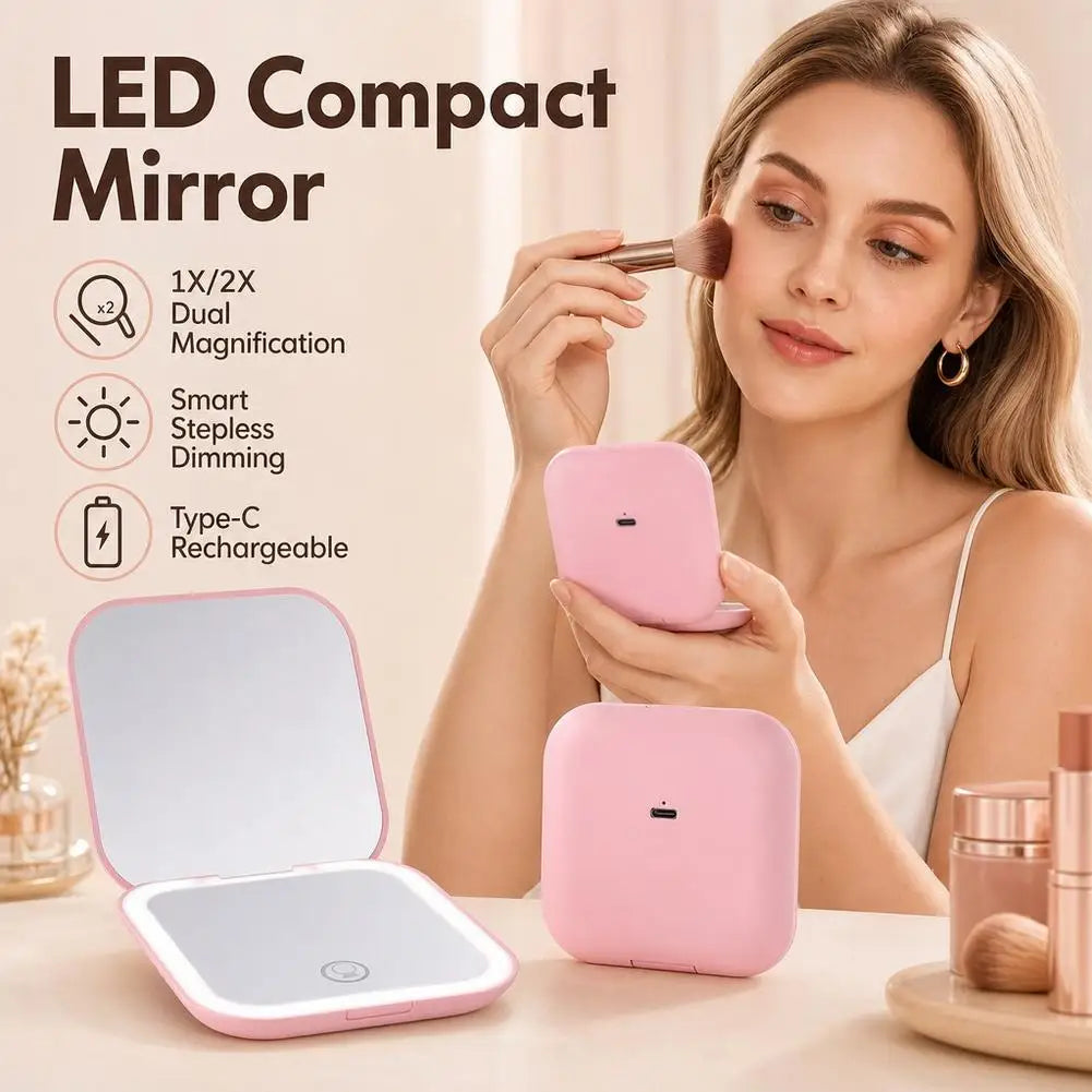 A woman holds a pink LED compact mirror and its folding case, demonstrating the dual magnification feature.