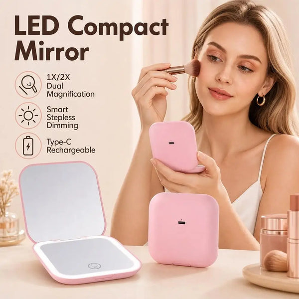 A woman holds a pink LED compact mirror and its folding case, demonstrating the dual magnification feature.