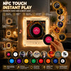 A retro NFC music box night light with a rotating disc is shown next to various decorative items and a hand.