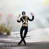 A black and gold poseable figure resembling Michael Jackson standing in a snowy outdoor setting.
