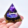 A purple and gold crystal pyramid shaped like a triangle, featuring an amethyst decorative crystal.