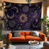 A dark purple tapestry featuring a celestial starry sky design with gold moon and stars hanging on a wall.