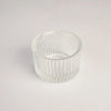 Clear glass candle holders with a ribbed texture for weddings and home decor
