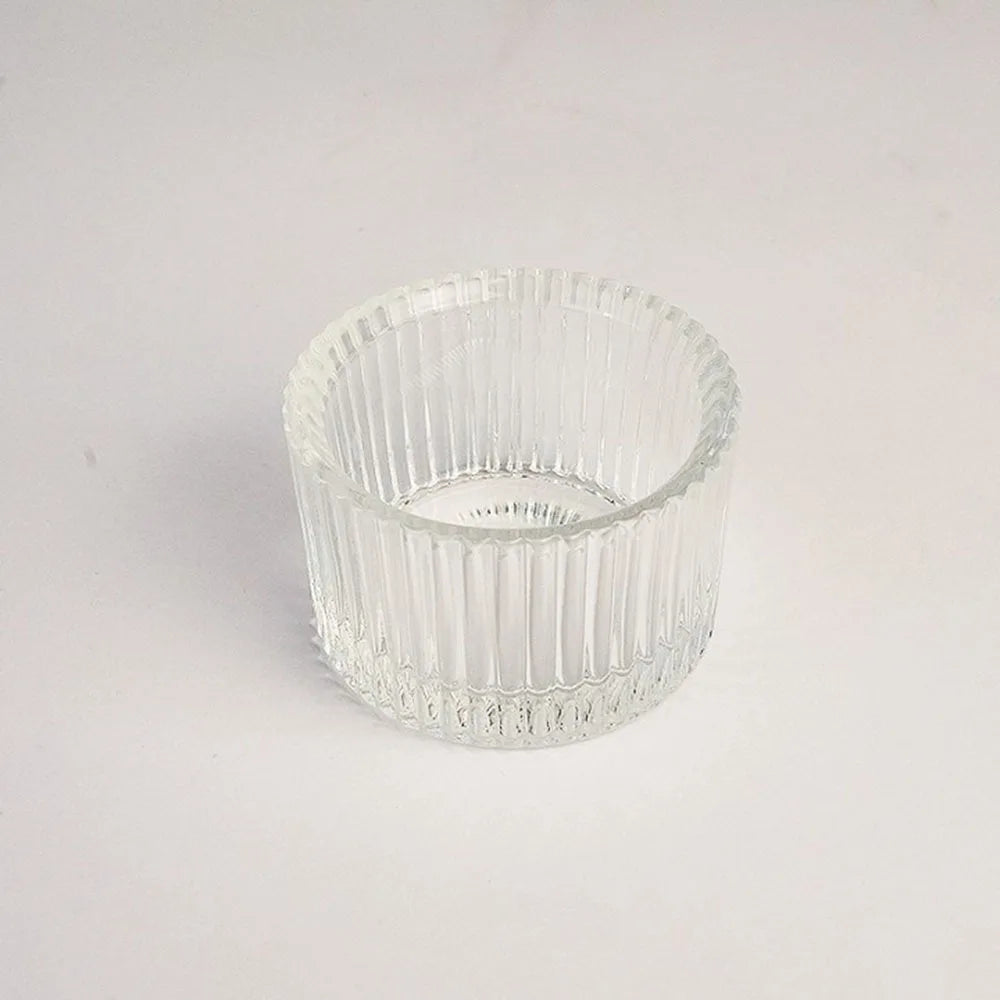 Clear glass candle holders with a ribbed texture for weddings and home decor