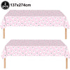 Two pink ghost patterned tablecloths for a Halloween party table set