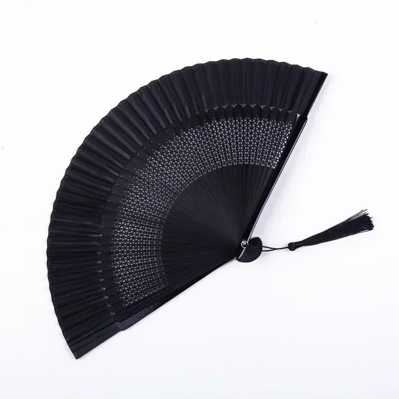 Black traditional Chinese folding fan with a pleated design.