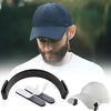 A man wearing a dark blue cap is shown with an adjustable hat brim shaper tool and a hat in the foreground.