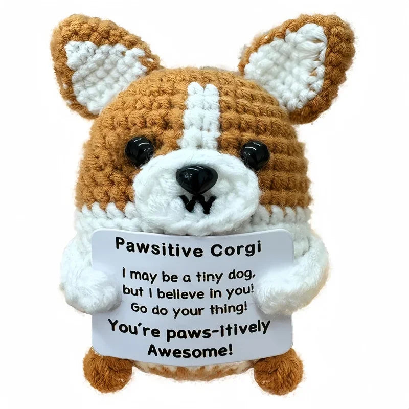 Handcrafted crochet corgi animal doll with white and brown fur and a positive message card