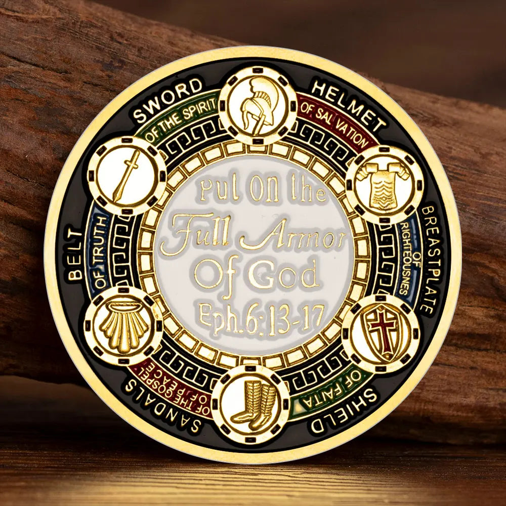 A round commemorative coin featuring the Armor of God design with various symbols and text.