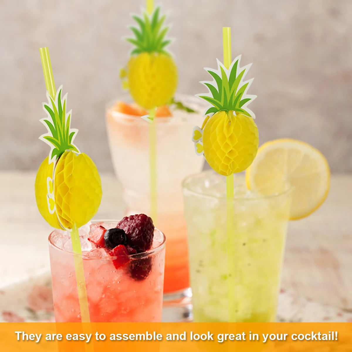 A glass cocktail featuring a pineapple garnish and tropical paper straws.