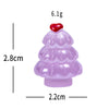 A small, round, purple resin Christmas tree charm with a red heart on top.