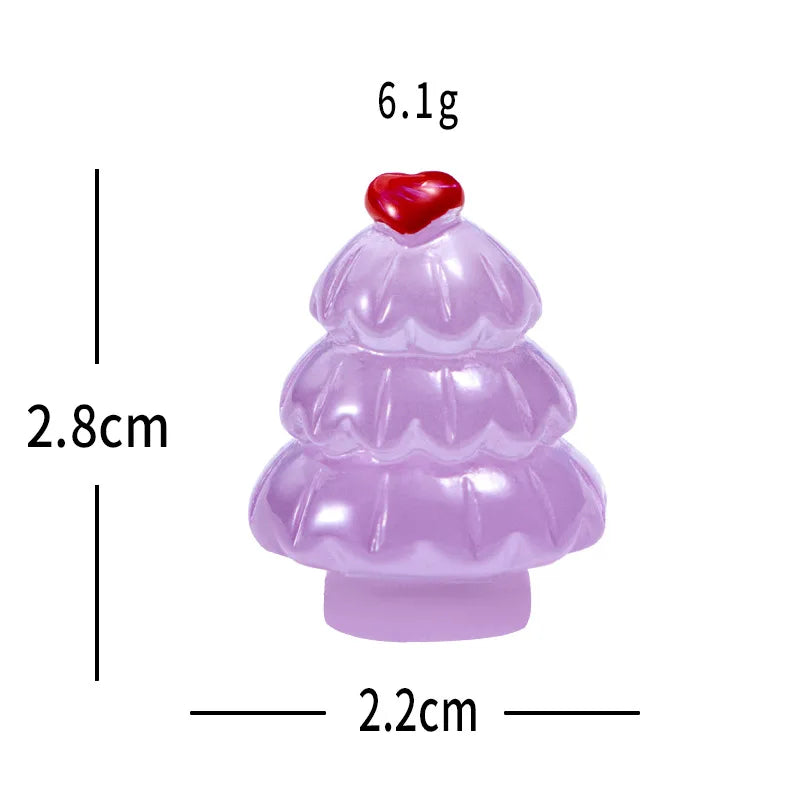 A small, round, purple resin Christmas tree charm with a red heart on top.