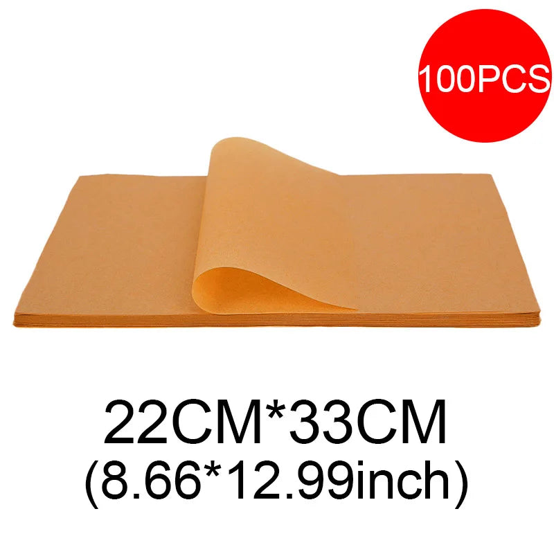 A stack of 100 non-stick baking sheets, light tan or beige color, shown flat.
