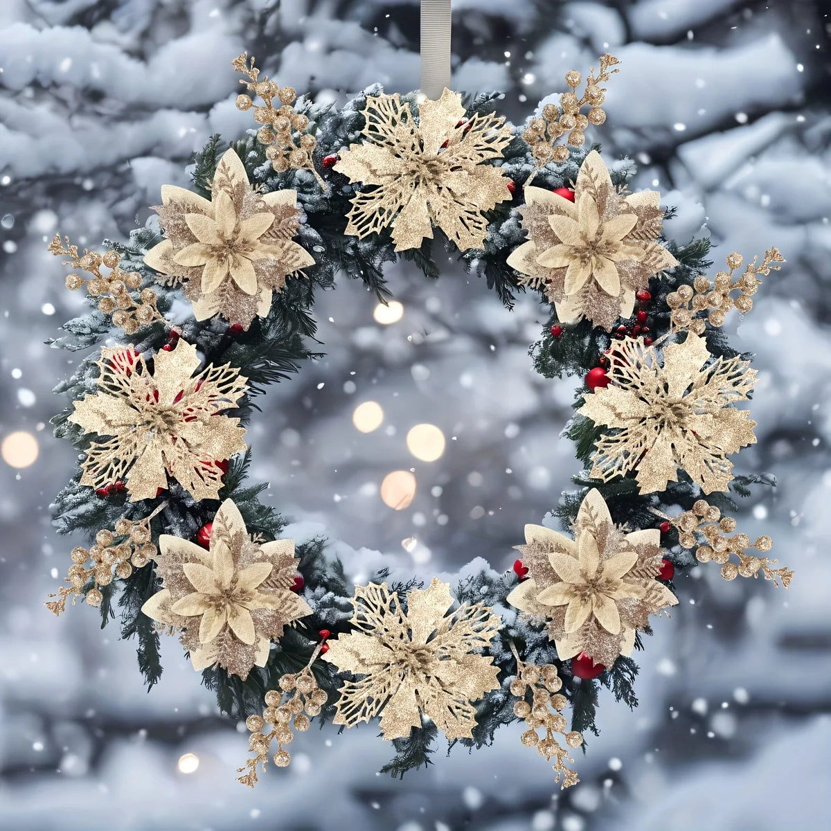A wreath of evergreen branches decorated with gold snowflakes and small red berries, set against a snowy background.