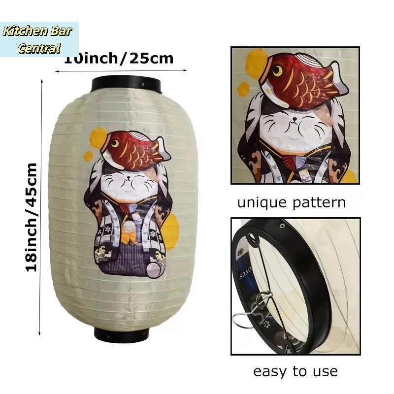 A light beige paper hanging lantern featuring a cat and a fish design, shown with dimensions and usage details.