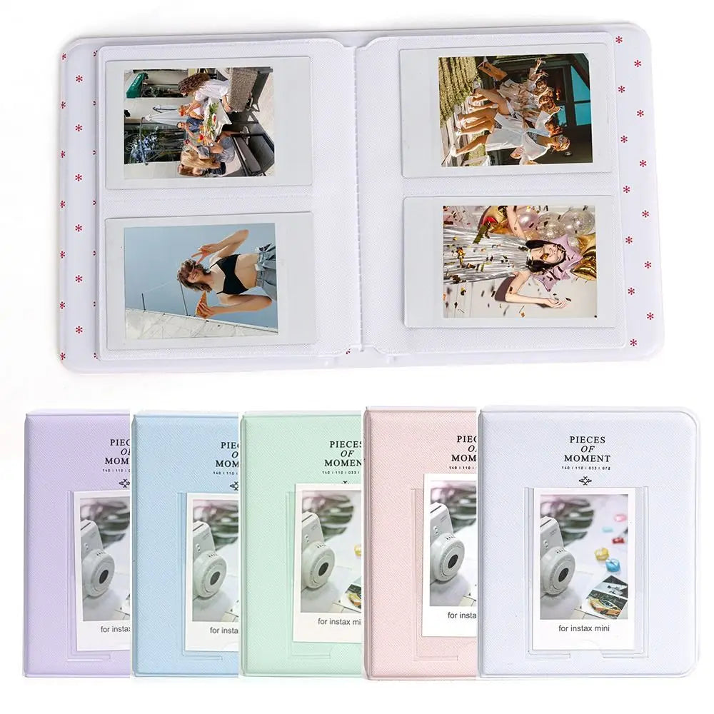 A white photo album with 64 pockets for instant cameras, featuring various photos.