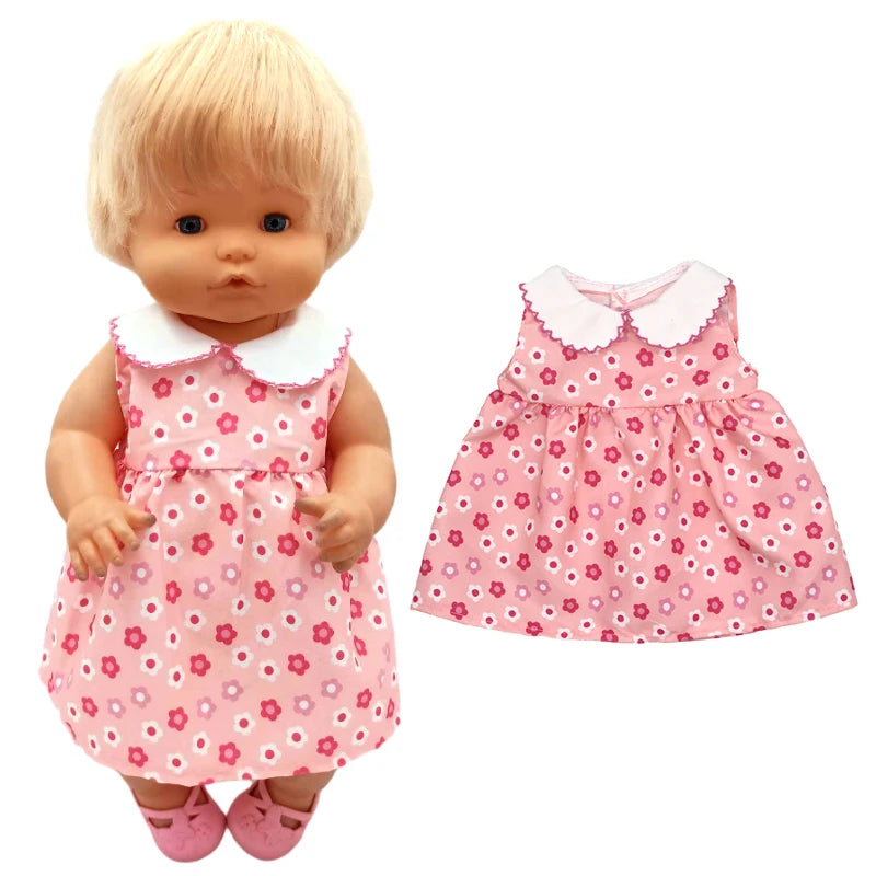 A blonde doll wearing a pink floral dress and a matching hat.